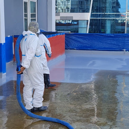 Applying polyurea advanced waterproofing on a roofdeck to prevent water leaks