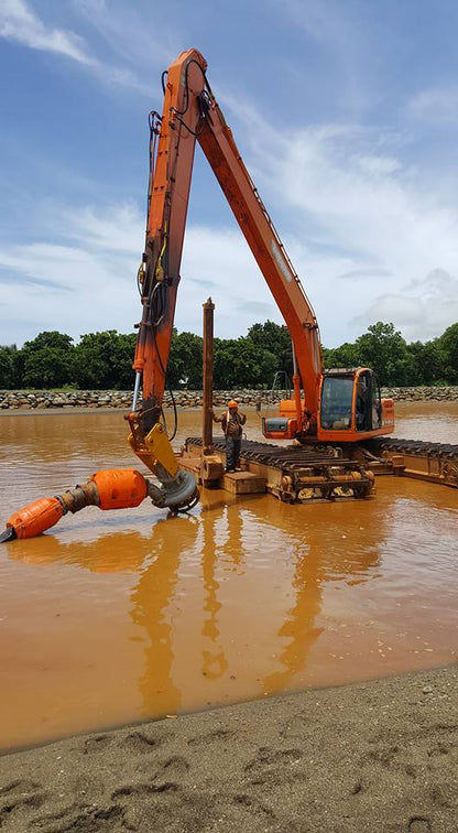 Dredging to remove silt and sediments from water for environmental protection