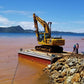 Dredging to remove silt and sediments from water for environmental protection